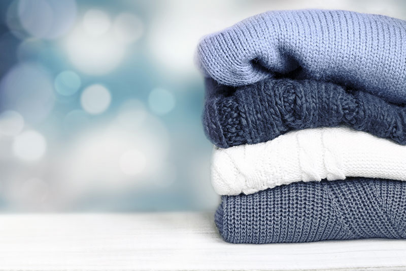 Putting winter clothes in storage - Utopia Cleaners