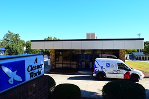 van in front of store