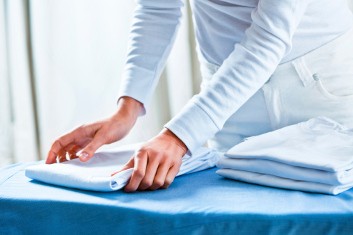 woman folding clothes