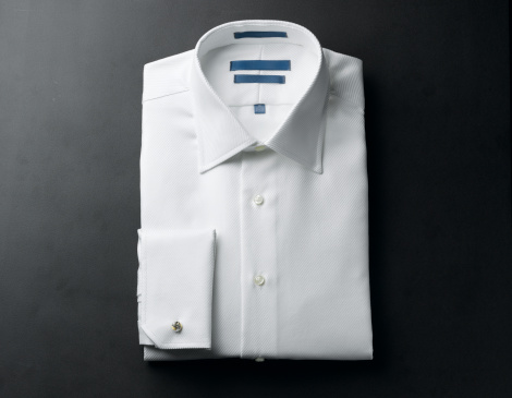 folded white dress shirt